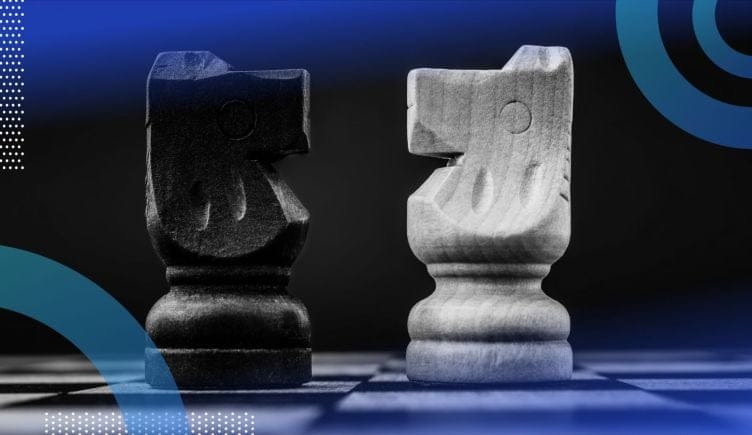 Two knight chess pieces square off representing dominated strategy