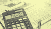 A yellow-toned image of a calculator displaying 